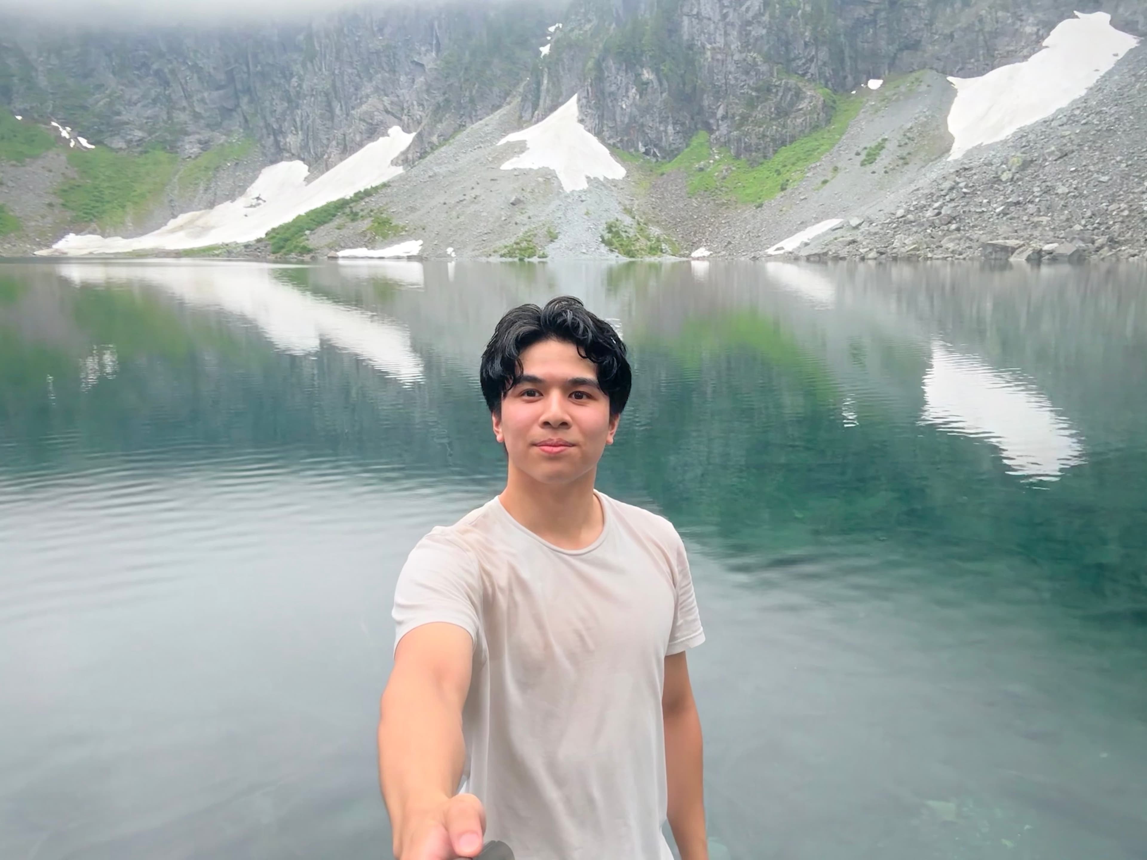 Ethan at an alpine lake in the Pacific Northwest